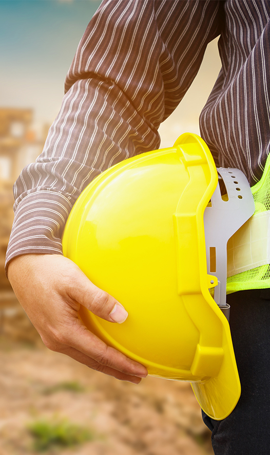 A Man Hold A Safety Helmet